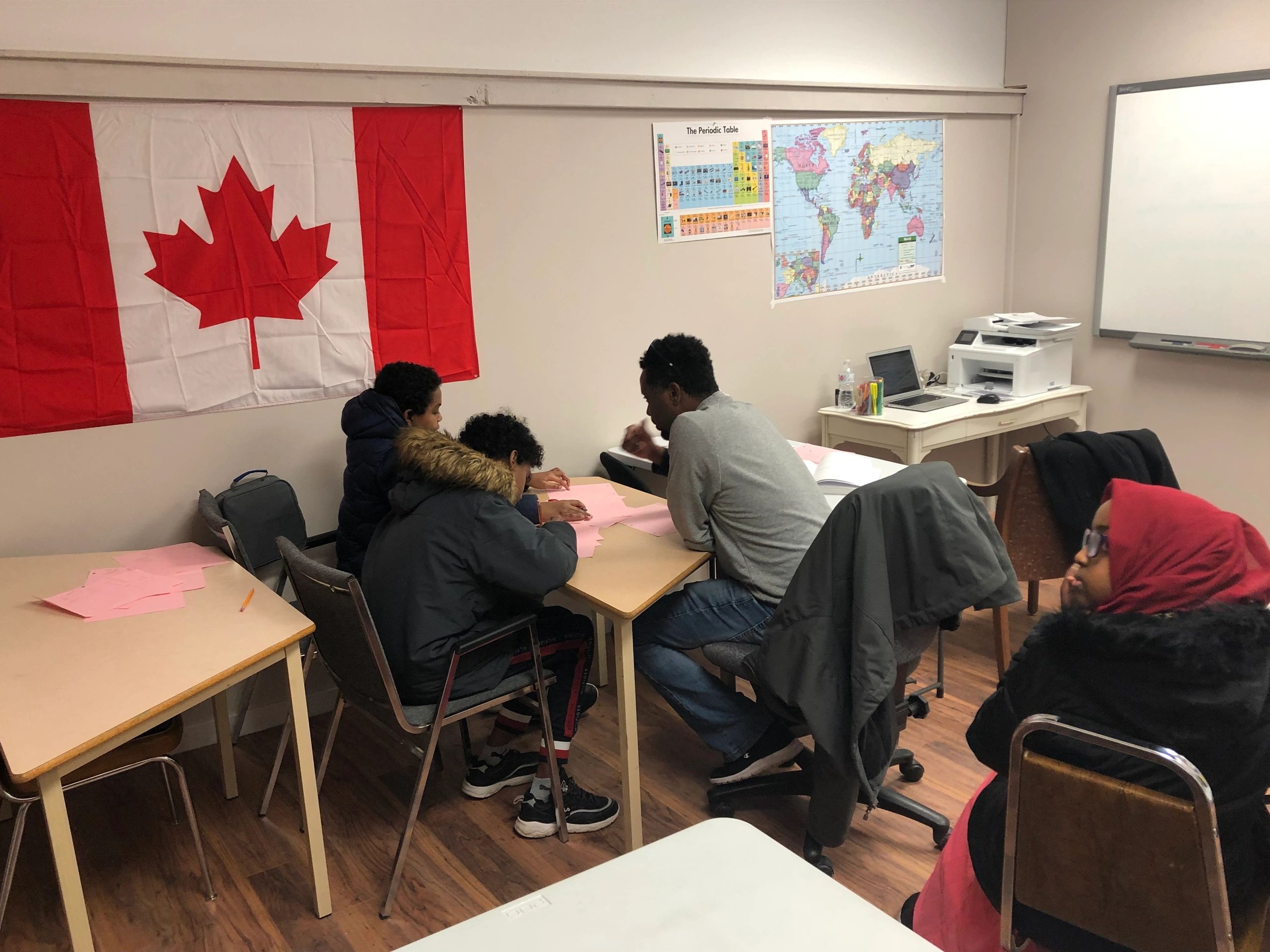 Volunteers and community members connecting through a Hope & Care Canada program